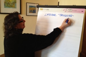 Liz Dreyer of EmcArts prepares for our lateral thinking exercises.